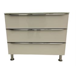 German design glass, white gloss and polished metal three drawer chest, purchased Redbrick Mill, Batley 