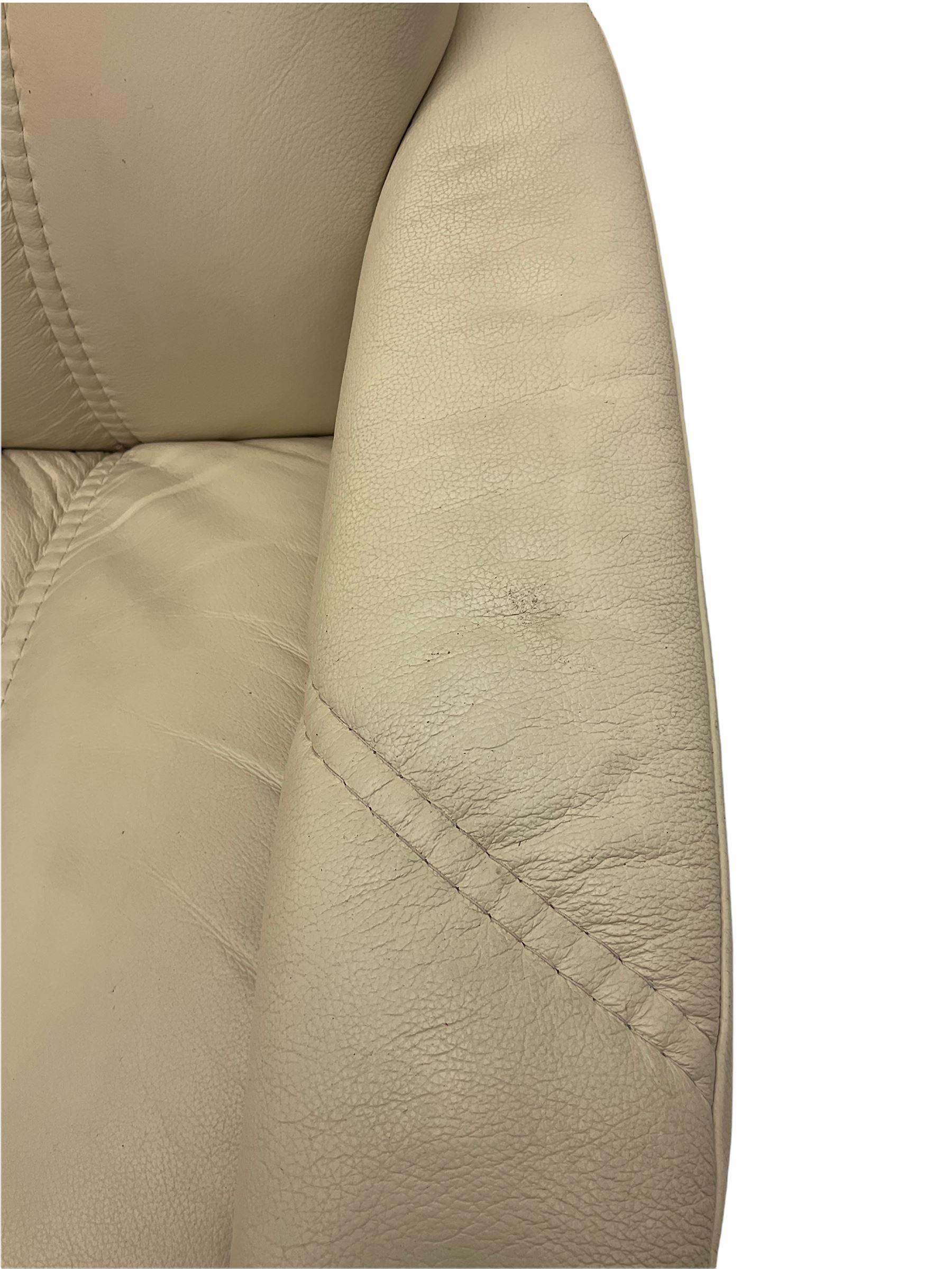 Ekornes - Stressless armchair upholstered in cream leather with matching footstool 
