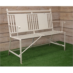  20th century strapped iron work, cream painted garden bench with twin panel back, W122cm  
