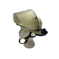 German fireman's helmet, circa 1950/60s, with visor and leather neck guard with leather lining marked 56-61