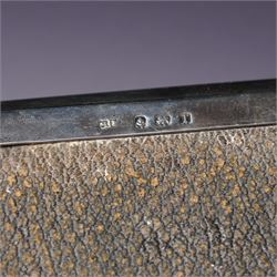 Edwardian silver rectangular trinket box with padded interior, the hinged cover inset with a tortoiseshell panel with pique decoration and on shaped supports W12cm Birmingham 1910 Maker Henry Matthews