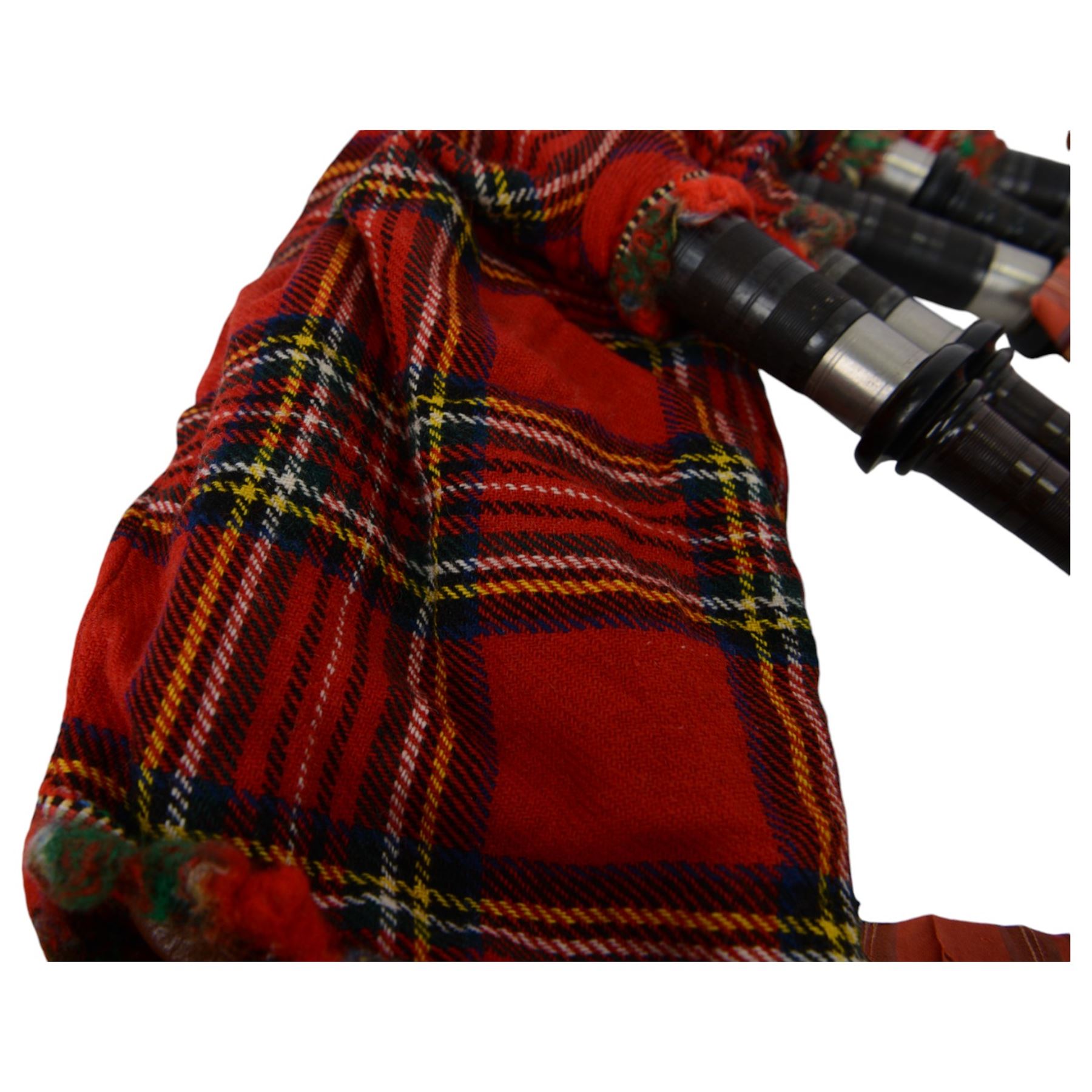 Set of mid 20th century bagpipes, with McLeod chanter, Royal Stuart cover, tassels, ribbons and spare accessories, contained within a wooden carry case, together with a Scarborough Highland Pipe Band uniform, comprising black highland dress jacket, Royal Stuart kilt, Glen Garry hat, Swinging Six sporren, Sgian Dubh knife, piper's dirk with knife and fork, etc