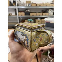 Chinese Qianlong enamel bombé shaped teapot, decorated with scenes of scholars examining a scroll and drinking on a yellow ground with various traditional floral and foliate motifs, the painted scene framed within trailing blue vine border, with Qianlong marks to base L15cm