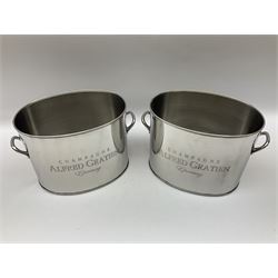 Pair of 20th century nickel plated champagne coolers inscribed Alfred Gratien Champagne, each flanked by twin loop handles, height 18cm