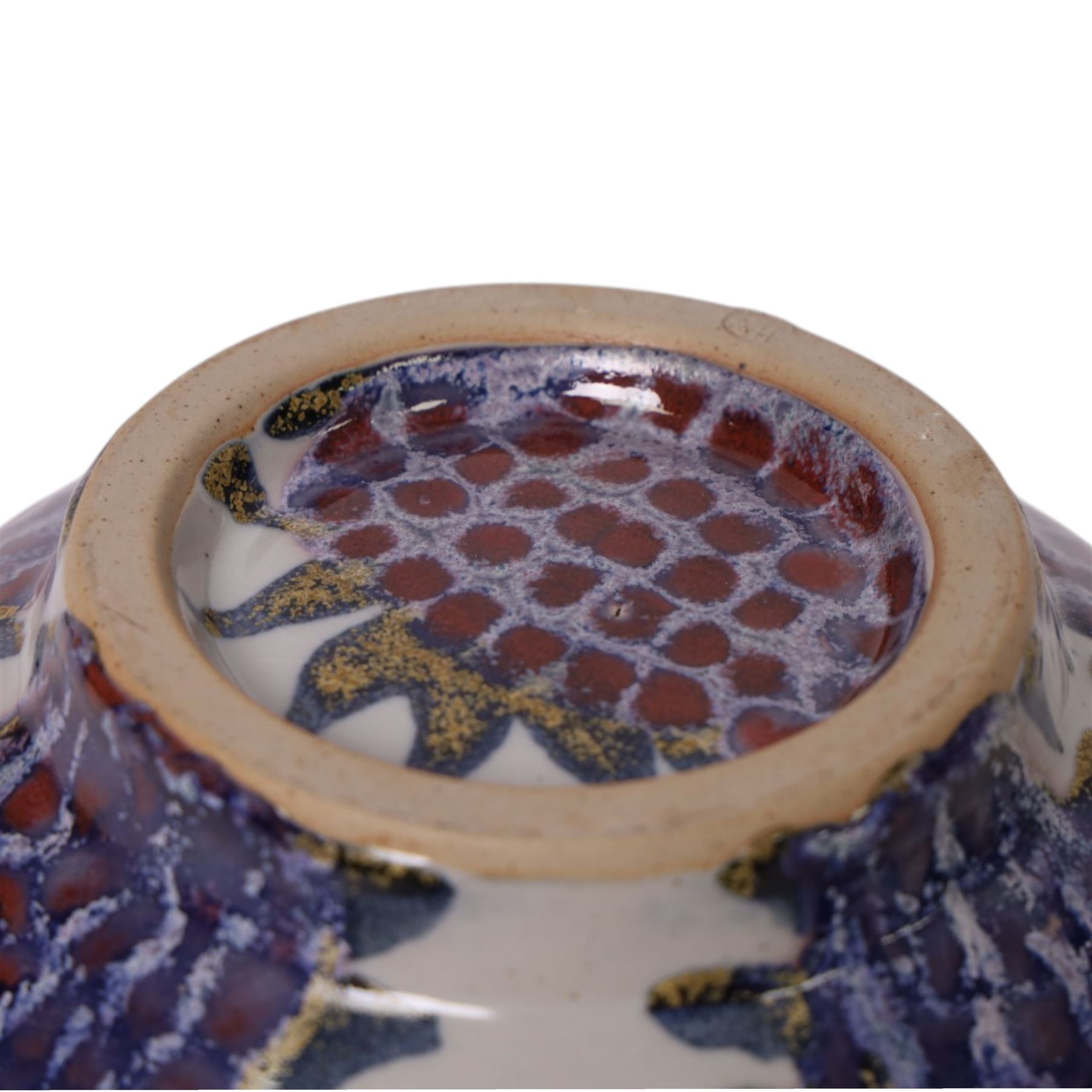 Sophie Hamilton (1963- ); Sunflower bowl, decorated with blue and purple sunflowers on a pale blue ground, with makers mark beneath, D23cm 