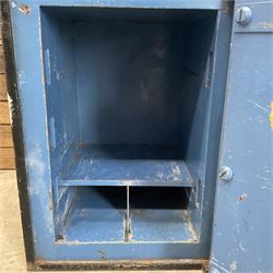 Samuel Withers & Co of West Bromwich - Victorian cast iron safe, the brass handle modelled as a clenched fist, painted in red, orange and black, with key. Ground floor delivery only, no steps.