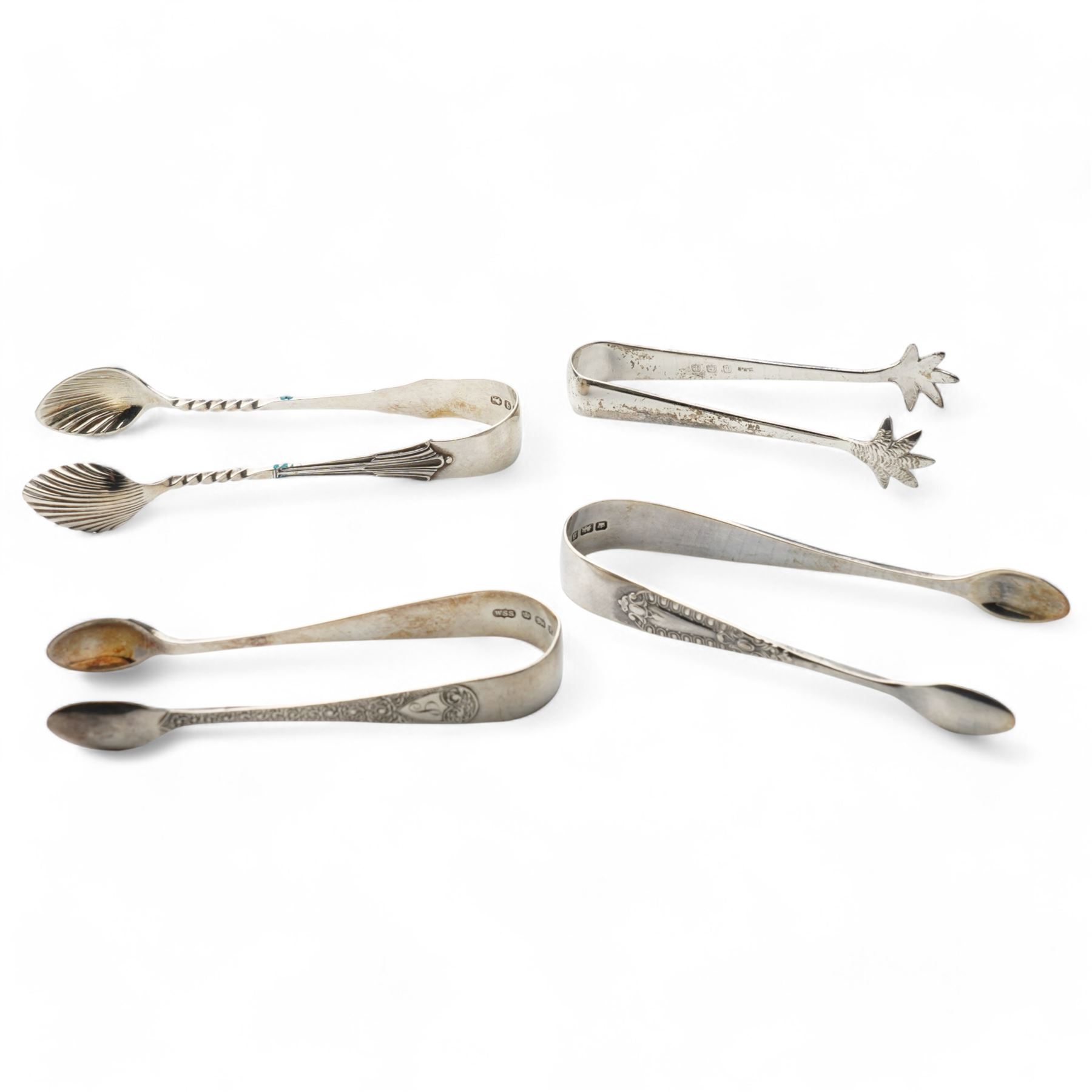Set of six Victorian silver coffee spoons with fluted bowls and engraved stems London 1891 Maker Josiah Williams & Co and four pairs of silver sugar tongs, various dates