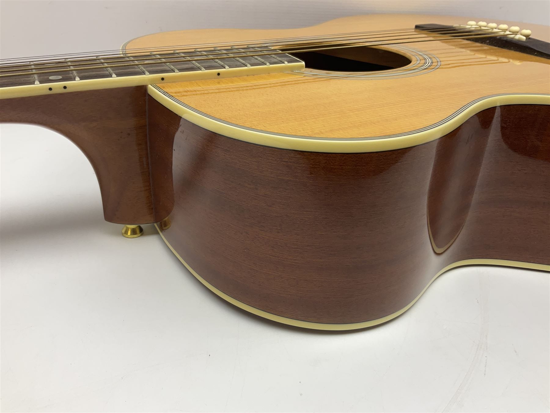 Woodstock model no.WHW41J203 acoustic guitar with mahogany back and sides and spruce top, serial no.2835 L102.5cm; in soft carrying case