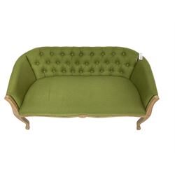 Contemporary two seat settee, upholstered in buttoned green fabric with studwork, raised on cabriole supports