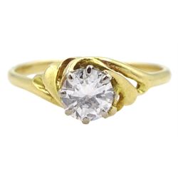 Gold single stone round brilliant cut diamond ring, with openwork crossover shoulders, stamped 18ct, diamond approx 0.55 carat 