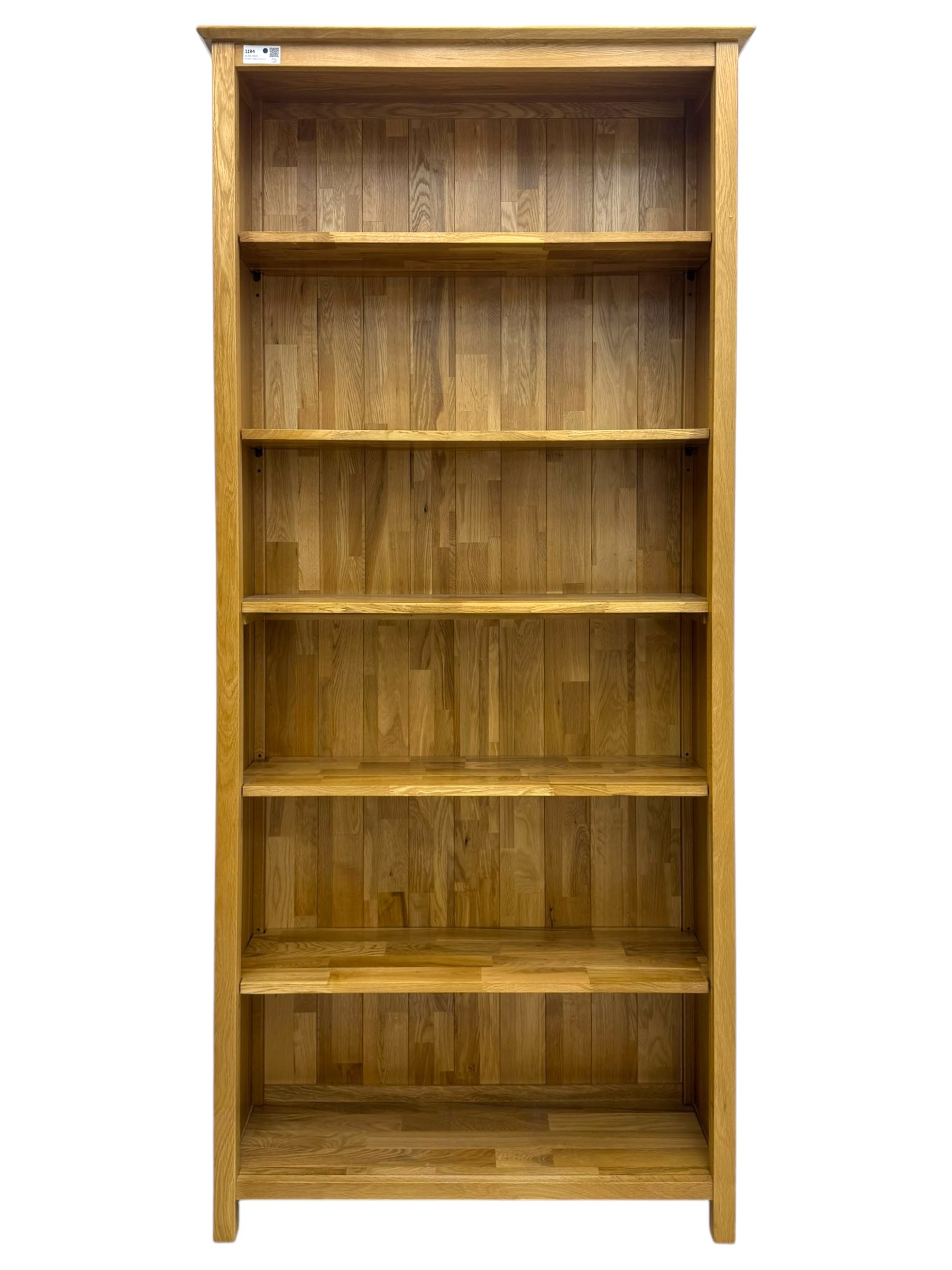 Light oak open bookcase, five adjustable shelves  