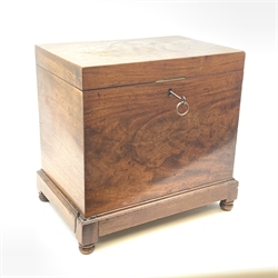 A 19th century mahogany box, with hinged opening cover, raised upon four squat bun feet (a/f), H41.5cm.