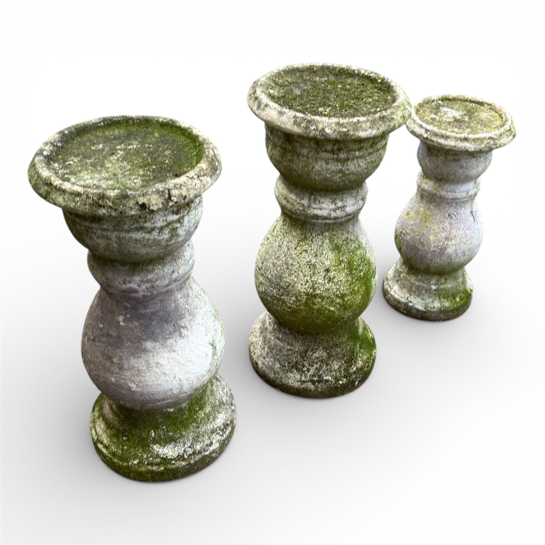 Trio of sandstone balusters with Two 19th century stone planters