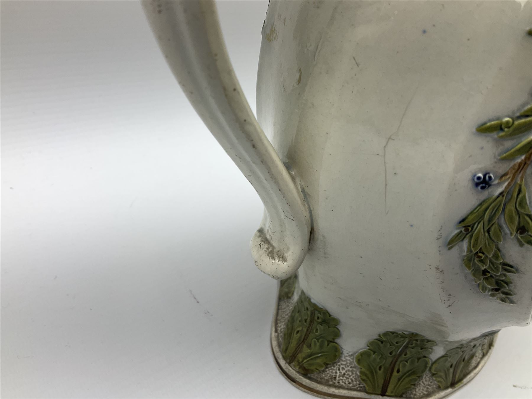 Early 19th century Prattware jug, circa 1800, decorated with two heart shaped panels of children, titled Sportive Innocence and Mischievous Sport, further decorated with acanthus and foliate borders, H22cm