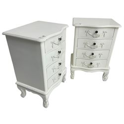 Pair of French design white painted serpentine bedside chests, fitted with four drawers each decorated with applied swags with flower heads, on cabriole supports