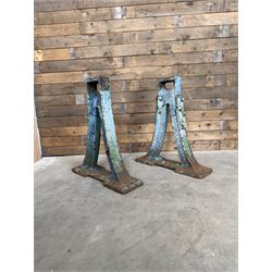 Pair of late 19th century heavy cast iron garden industrial trestles, painted in distressed blue paint