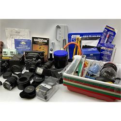 Vintage and later cameras, lenses, accessories and darkroom equipment including Zenit 12XP camera, Praktica BX20 camera fitted with 'Sigma Zoom Master 1:3.5-4.5 f=35-70mm' lens, Praktica LLC camera fitted with 'Carl Zeiss Jena Pancolar 1.8/50' lens, Canon Zoom Lens 'EF 100-300mm 1:5.6', various Jessop and other makers darkroom items including safelight (Red), universal duo tank, multi-mask enlarging easel etc, in three boxes