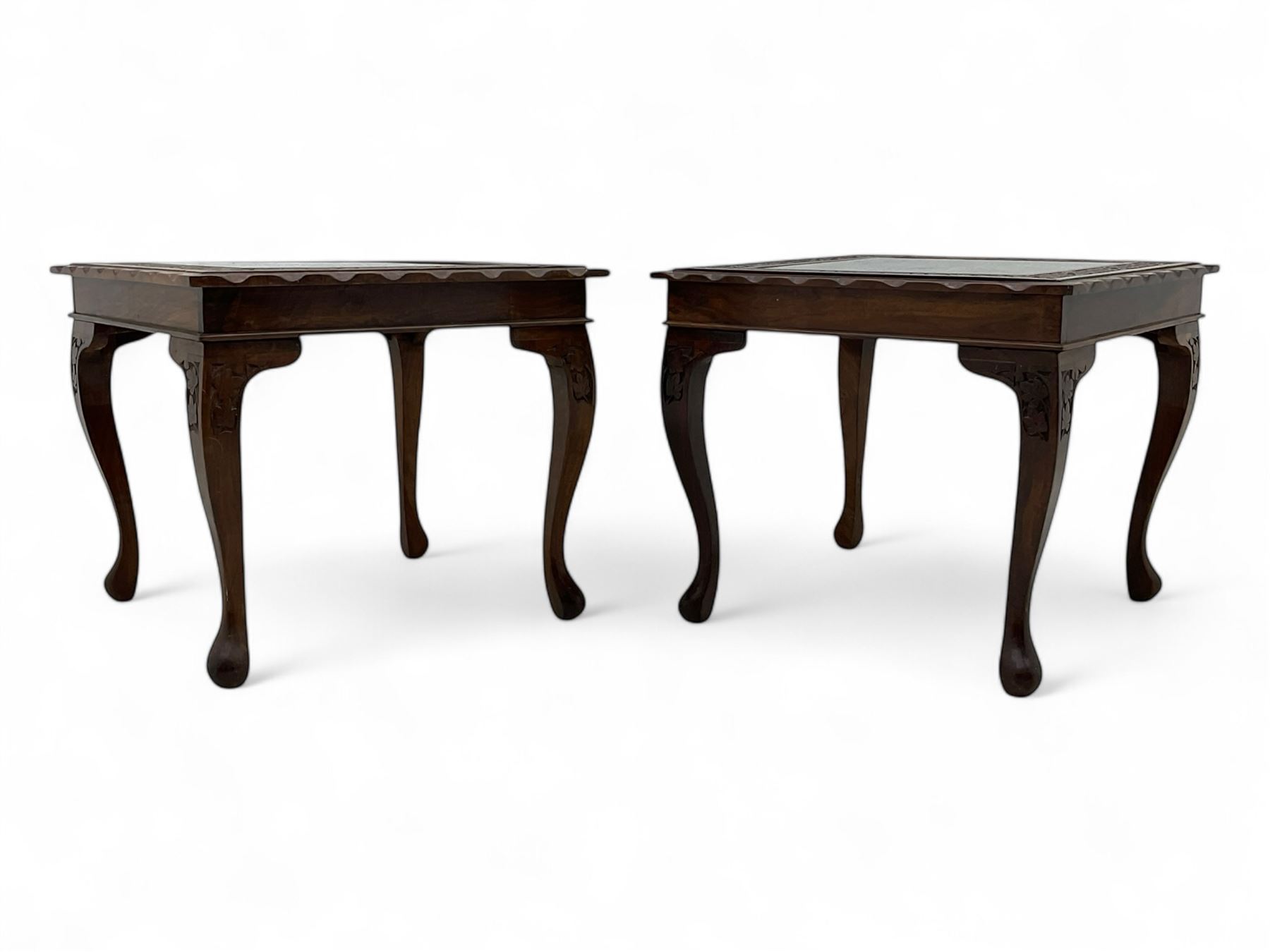Pair of Pakistan carved hardwood brass inlaid lamp tables, square form, cabriole legs, inset glass tops