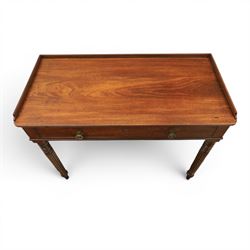 Early 19th century mahogany dressing table, rectangular top with three quarter gallery, frieze drawer with two brass knobs, stamped 'Gillow', raised on turned and reeded supports 