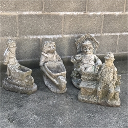 Two composite stone garden Gnomes, a hedgehog pushing a wheelbarrow and a man sat on a bench (4)