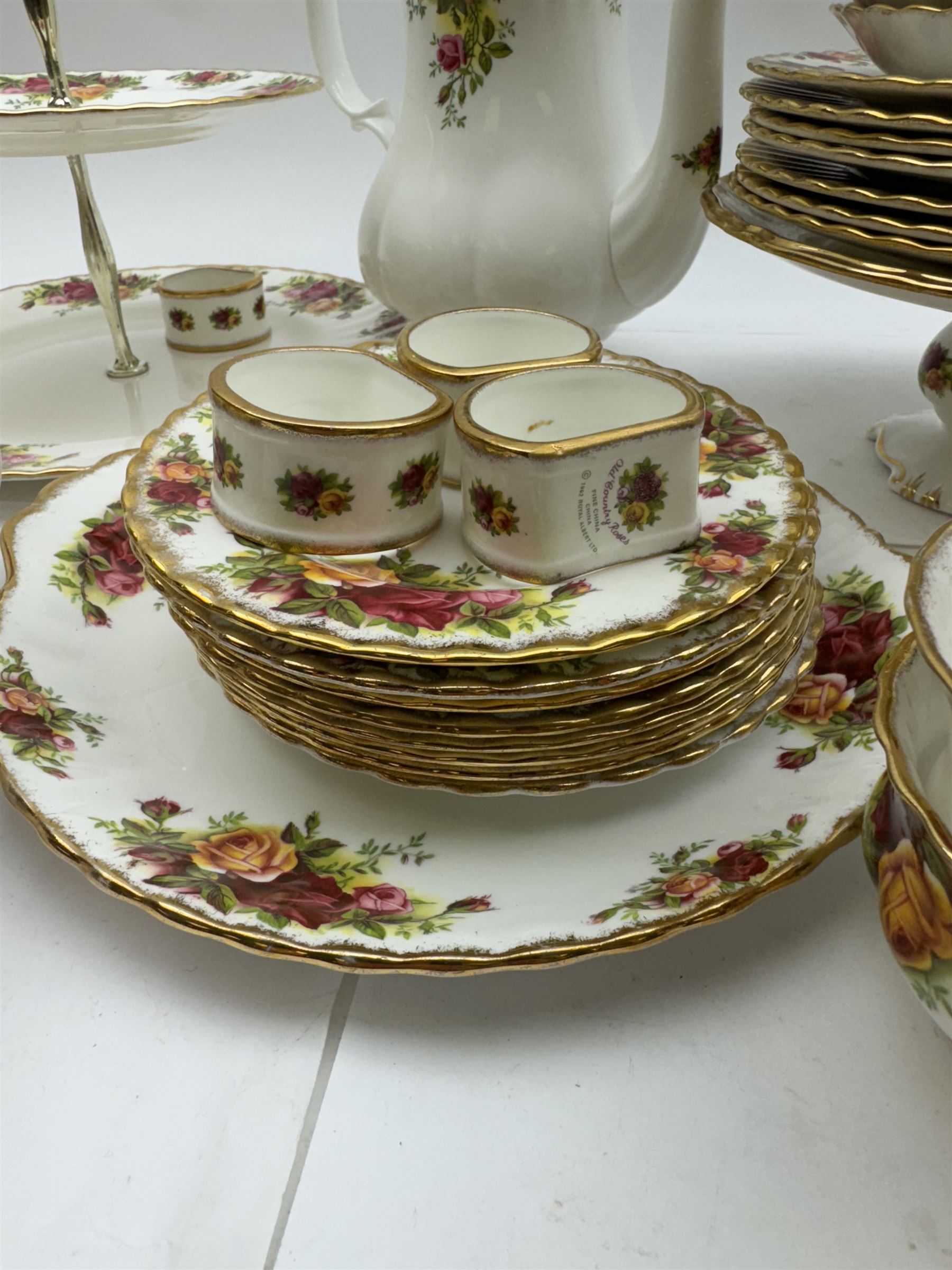 Royal Albert Old Country Roses pattern tea wares, comprising coffee pot, jug and sugar bowl, cake stands, napkin rings, teacups and saucers, side plates, dessert plates, small plates, all with printed marks beneath