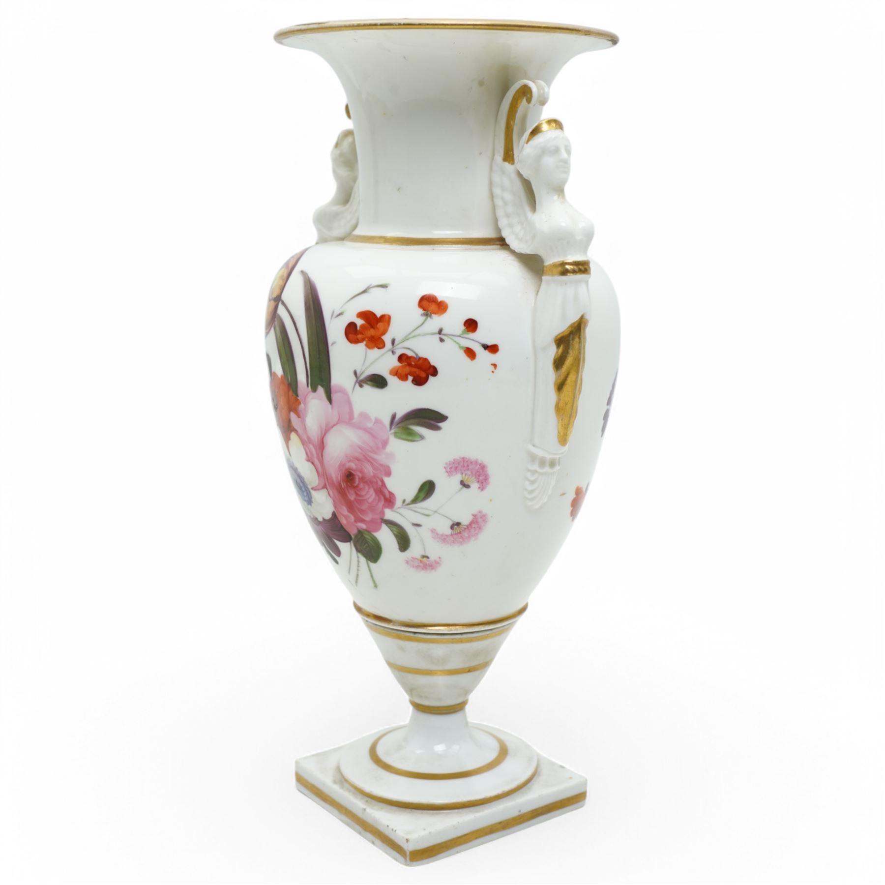 Early 19th century porcelain baluster vase, hand painted with roses, tulips etc having winged caryatid handles, H27cm. Old paper label from D.M. &  P. Manheim inscribed 'Derby'