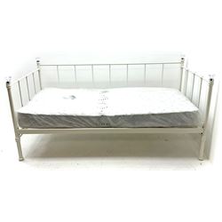 White metal day bed with mattress