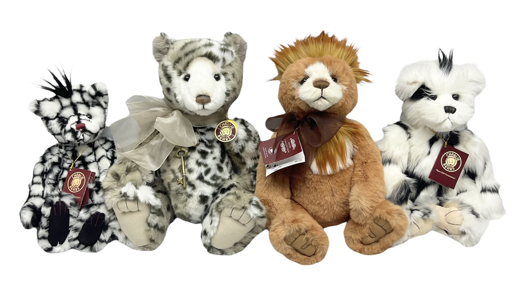 Four Charlie Bears, comprising Geoffrey CB131384, and Hawkins CB202024A, both designed by Isabelle Lee, and Tia CB161507O, and Chequers CB161525O, both designed by Heather Lyell, all with tags 