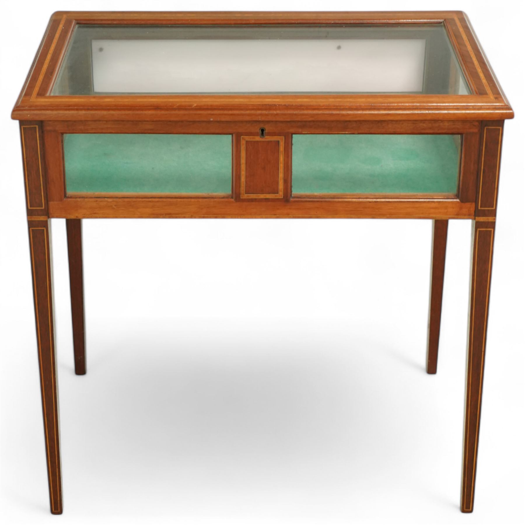 Edwardian satinwood and inlaid bijouterie table, rectangular hinged glazed top above a baize-lined interior, frieze with panelled inlay detail, raised on square tapered legs with boxwood and ebony stringing