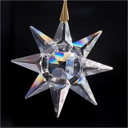 Eight Swarovski crystal snowflake Christmas ornaments, comprising years 1991-1998, some with certificates, boxed (8)