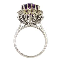 18ct gold circular purple stone ring