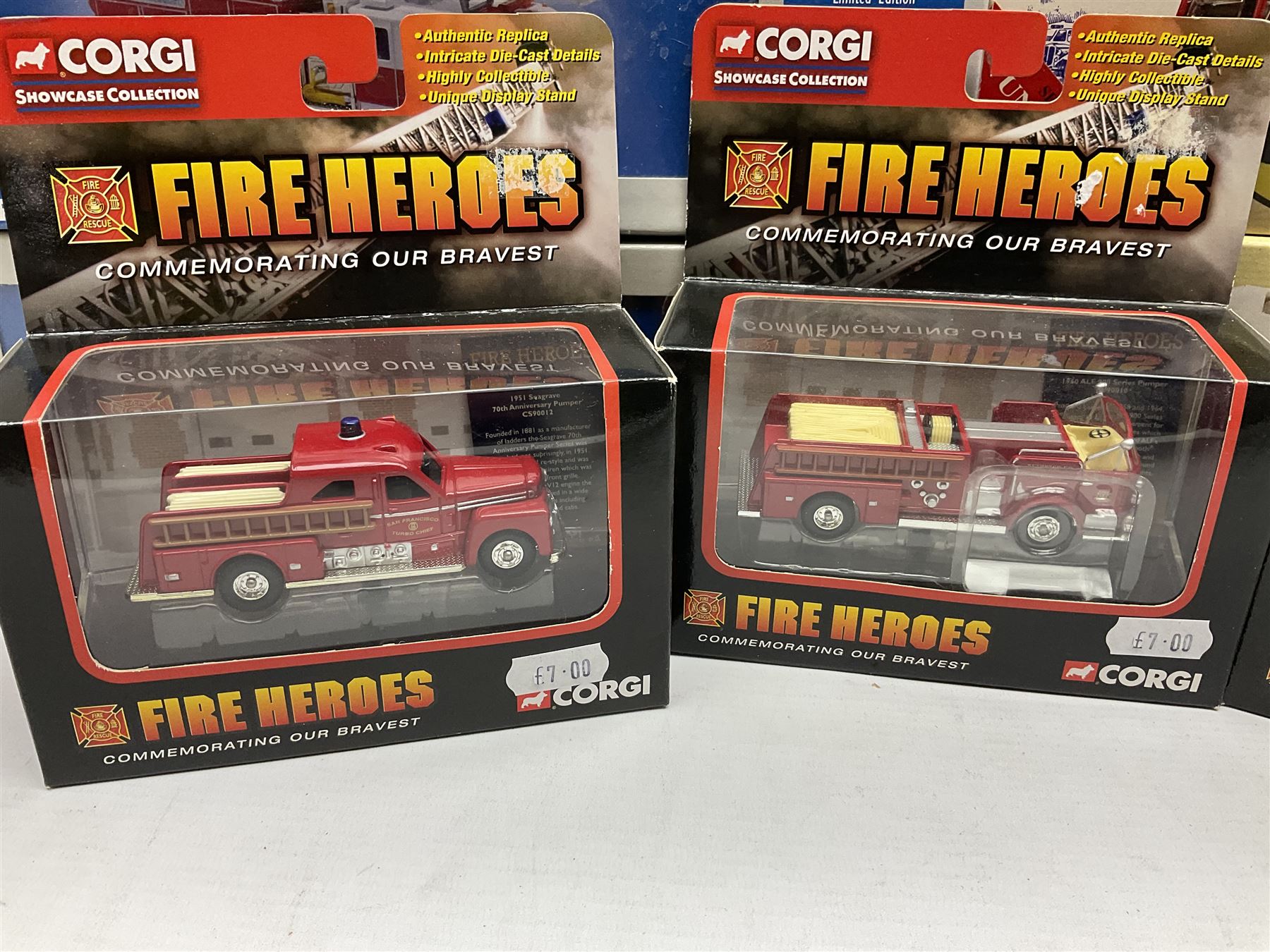 Corgi - eleven fire-fighting vehicles comprising limited edition 54706 E1 Side Mount Washington DC and 54902 E1 75ft Ladder Duncan Fire Department; 97392 Simon/Dennis Hydraulic Platform; 97361 AEC Turntable Ladder;  and seven 'Fire Heroes'; all boxed (11)