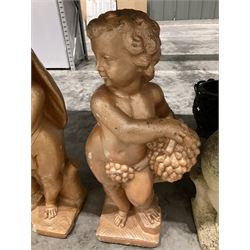 Set of four representations of the seasons in the form of putti - THIS LOT IS TO BE COLLECTED BY APPOINTMENT FROM DUGGLEBY STORAGE, GREAT HILL, EASTFIELD, SCARBOROUGH, YO11 3TX