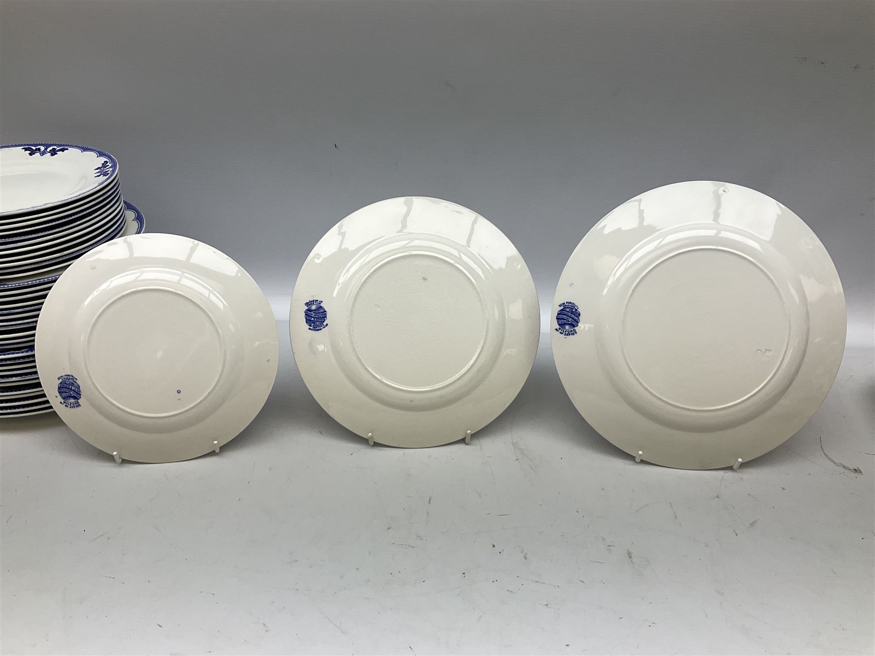 Burgess and Leigh Middleport pottery dinner wares decorated in the ‘Milford’ pattern, to include lidded tureens, graduated meat plates, dinner plates etc 