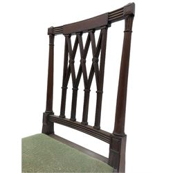 Pair 19th century mahogany side chairs, the inlaid and reed carved cresting rail over lattice back, the turned uprights with carved foliage capitals, upholstered drop in seat, lobe carved and turned supports