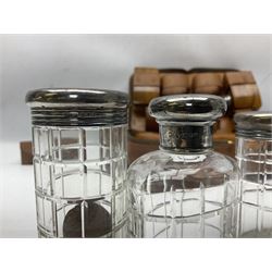 Mappin & Webb leather cased campaign gentleman's vanity set, the tan leather case opening to reveal fitted interior with five engine turned silver capped glass vanity bottles, hallmarked Mappin & Webb, London 1944, brushes, mirror etc, monogram DPK to the top of the case