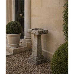 19th century weathered sandstone birdbath, formed in four sections, square top with carved...