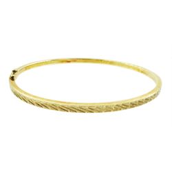 9ct gold bangle, 8ct gold signet ring and a 9ct gold manual wind wristwatch, on 9ct gold bracelet