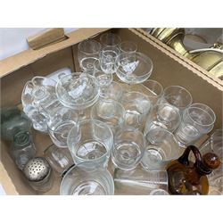 Assorted glassware, to include 19th century decanters, drinking glasses, and a collection of metal ware, including pestle and mortar, two silver plated bottle coasters, oil lamps, etc., in three boxes 