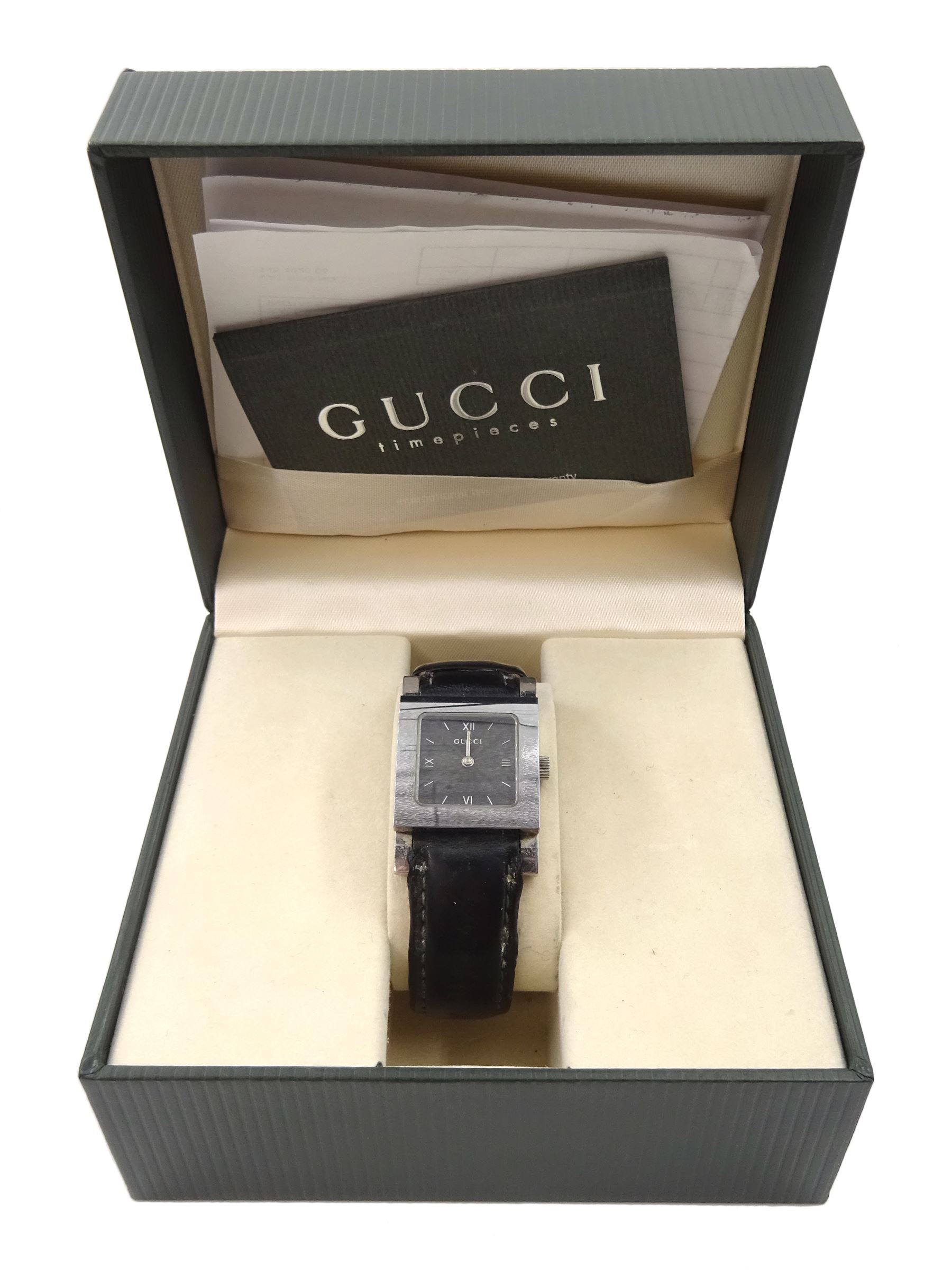 Gucci stainless steel quartz wristwatch model No. 7900 L, on leather strap, boxed with papers and receipt dated 2001