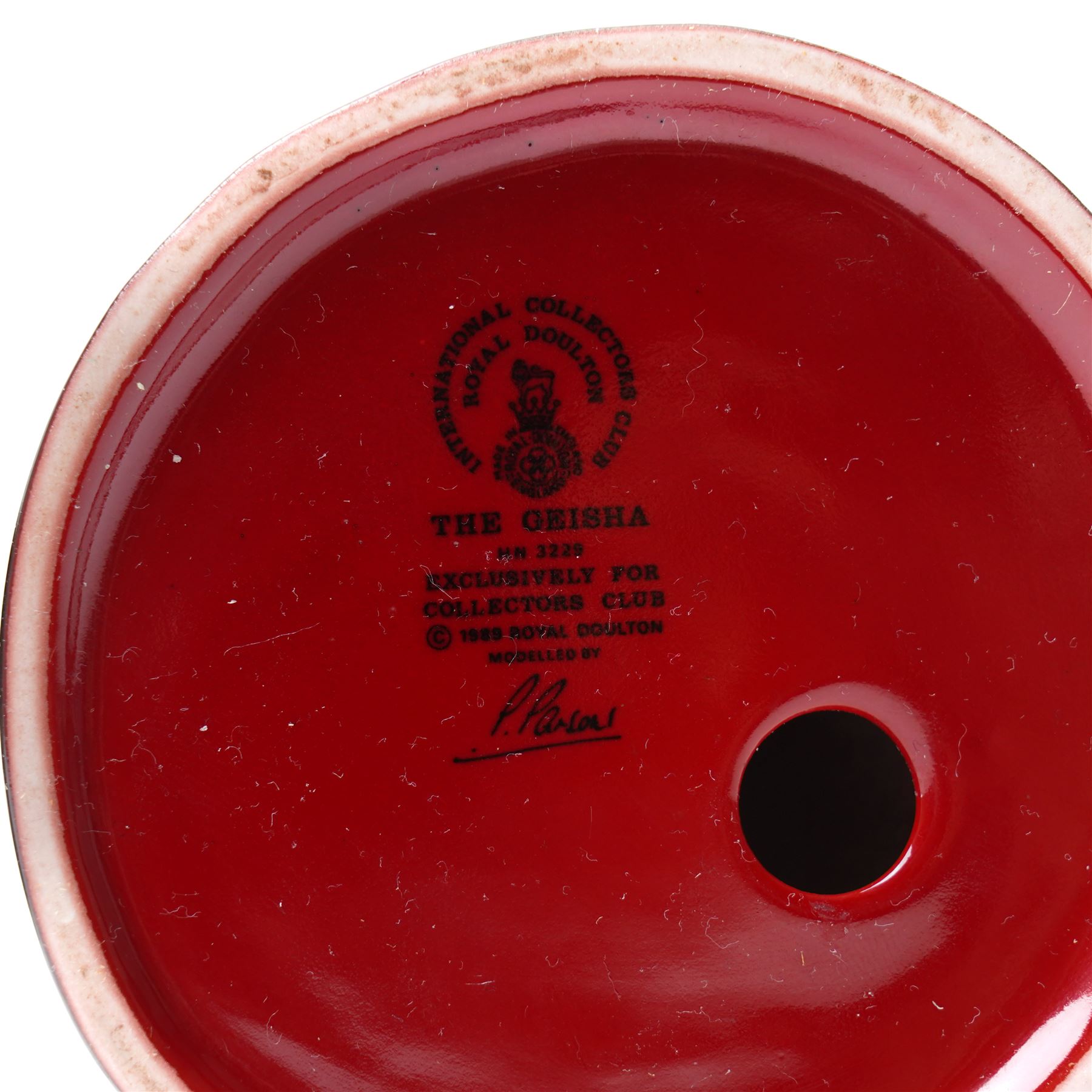 Royal Doulton flambe figure 'The Carpet Seller' HN2775 and another exclusively for the Collectors Club  'Geisha' HN3229 (2)