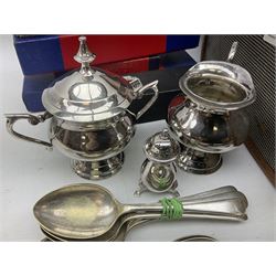Three piece silver plated condiment set comprising; lidded mustard, salt, and pepper pot, with blue glass cases, together with large collection of silver plated Community  flatware etc, in two boxes 