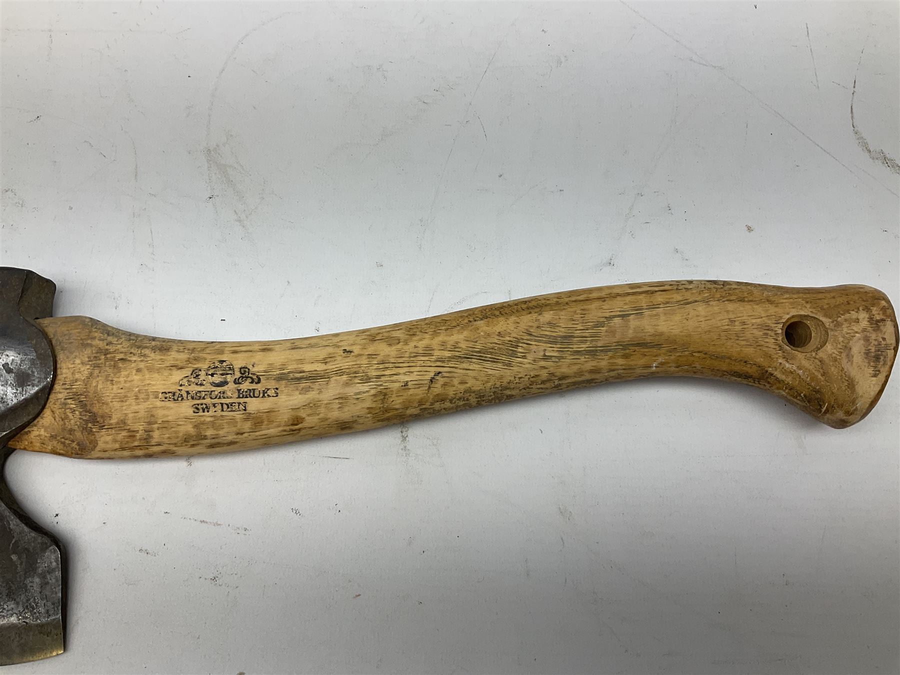 Gransfors Bruk Sweden carving axe, the head stamped both sides including smith's initials, on stamped hickory shaft, in leather sheath L43cm