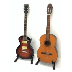 Hohner Arbor Series electric guitar in black and elm effect, serial no.E714703, L101cm; together with an acoustic guitar L102cm; with two Kinsman folding stands (4)