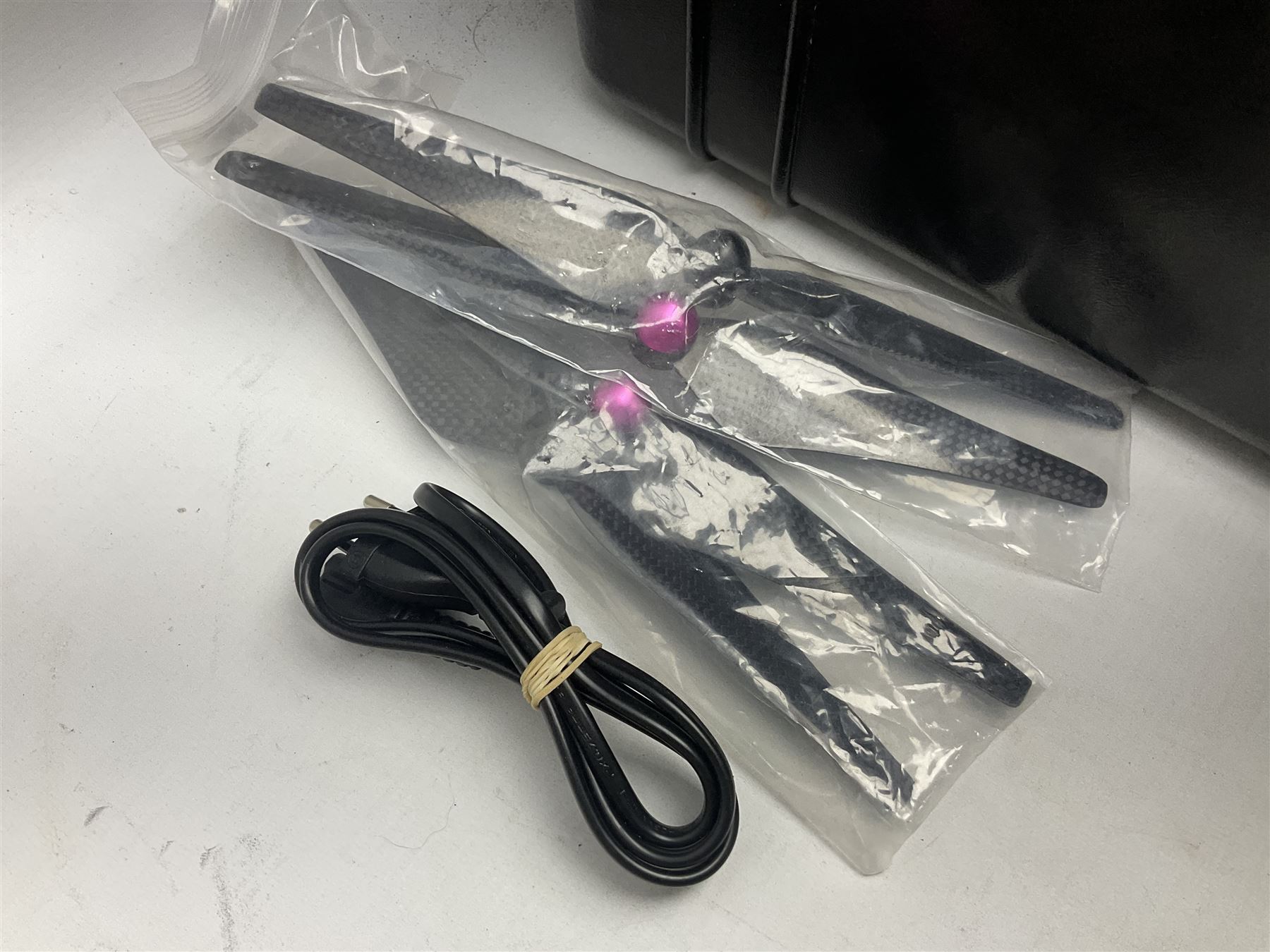 DJI Phantom 2 Vision Plus 3.0 drone, with controller, battery pack, blades, chargers and other accessories in fitted foam lined hard plastic case