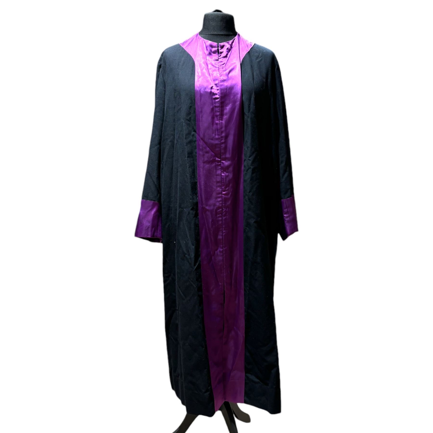 Ede & Ravenscroft two barrister/ judge horsehair wigs in fitted tins by 'Ede & Ravenscroft Law Wig & Robe Makers 93/4 Chancery Lane, London, inscribe upon the tins 'Ian R.Britton.Esq' and His Hon Judge Britton, together with judges robe 