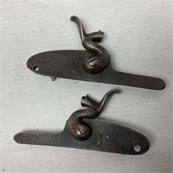 Two leather shot flasks with embossed decoration and brass nozzles; scissor action bullet mould with two ladles; pair of 19th century J.B. Warrilow hammer actions; small quantity of Staybrite buttons; and 1968 dated metal ammunition tin for 200 x 7.62 blank cartridges