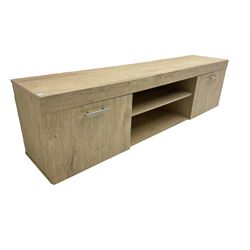 Light oak finish television stand, fitted with two cupboards and central shelf