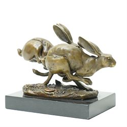 Bronze figure group, modelled as two hares in chase, after 'Nick', with foundry mark, upon a rectangular base, H11cm L15cm
