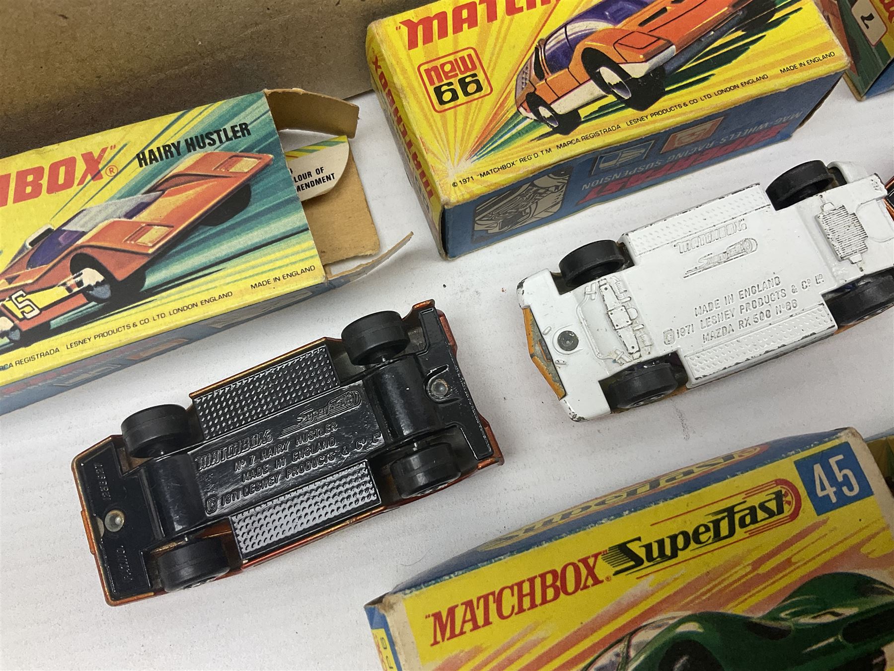 Matchbox Superfast track racing Set with Superbooster and two boxed SF-17 Slipstream Curves; together with five boxed Superfast models - 3d Monteverdi Hai, two 7d Hairy Hustler, 45c Ford Group 6 and 66d Mazda RX500; and quantity of unboxed and playworn other die-cast models